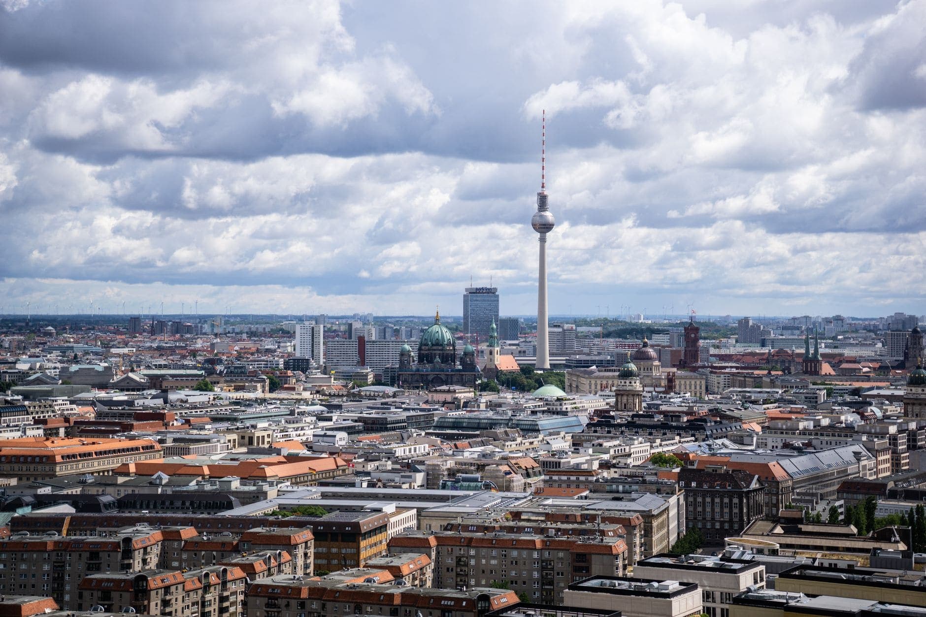 A stunning aerial view of Berlin's cityscape showcasing the iconic TV tower and modern architecture.